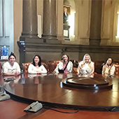 Five HSAD students sitting around large table in Philadelphia City Council caucus room